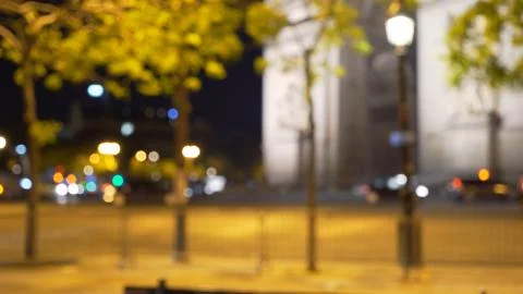 Blurry background of area by Arc de Trimphe in Paris at night for compositing Stock Photos