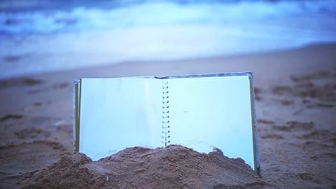 Blurry background book on the sand Stock Footage 94018461