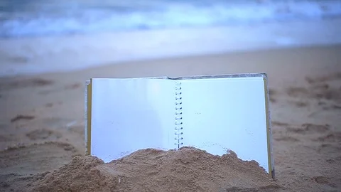 Blurry background book on the sand while human play ground Stock Footage 94018464