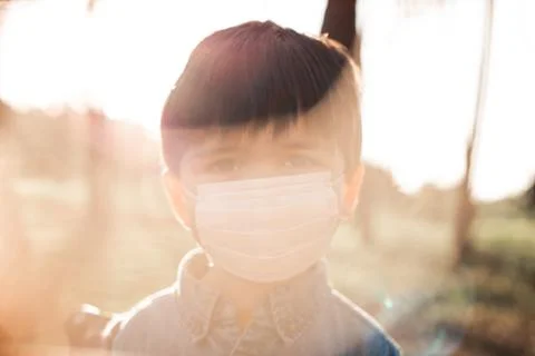 Blurry background of a kid portrait using air mask Stock Photos