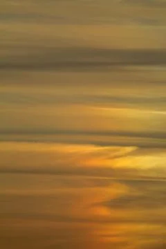 Blurry background of red sunset sky. Dramatic sky with colorful cloud backg.. Stock Photos