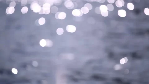 Blurry background with Sea Waves and Sun Glare on the Water. Stock Footage 162223528