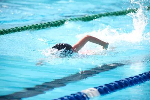Blurry background of splash drop water on swimming race with swimming competi Stock Photos