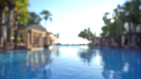 Blurry background swimming pool resort setting for composite work. 動画素材 202007770