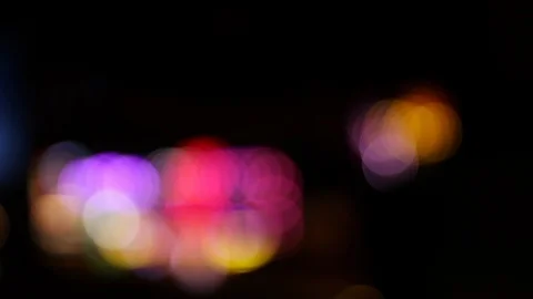 Blurry blinking lights at carnival fairground during the night Stock Footage 123071087