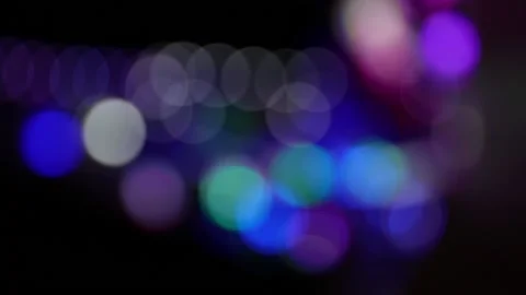 Blurry blinking lights of a carnival fairground at night Stock Footage 154649225