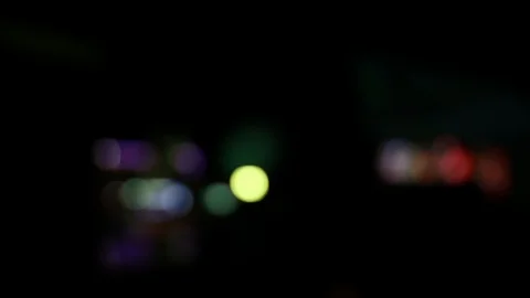 Blurry blinking lights at night creating bokeh effect Stock Footage 123705749