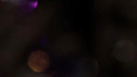 Blurry bokehs shining in the dark Stock-Footage 317461889