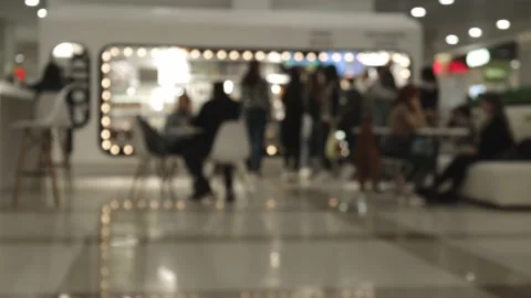 Blurry cafe with people drinking coffee and tourists walking by. urban life. Stock Footage 233563746