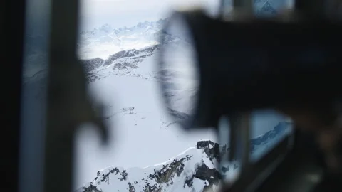 Blurry camera with the reflection of winter landscape from the lens. Stock Footage 169188395