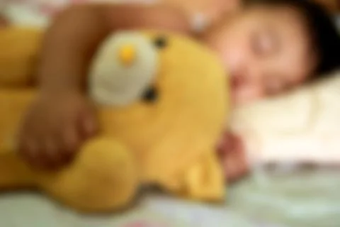 Blurry a child sleep Stock Photos