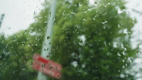 Blurry Cityscape Through Rainy Car Window Stock Footage 342047002