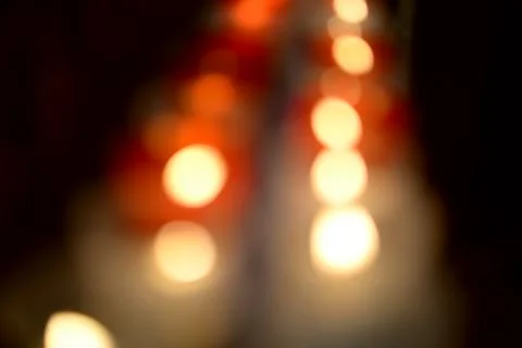 The blurry colored lights create an interesting abstract pattern. Warm color Stock Photos