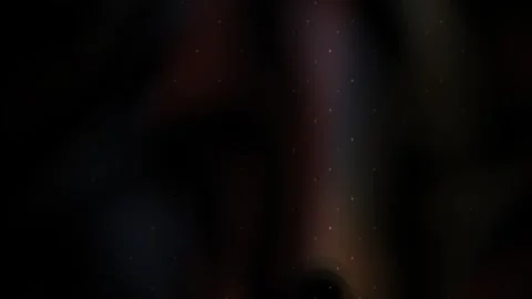 Blurry colorful objects in dark. Stock Footage 337500183
