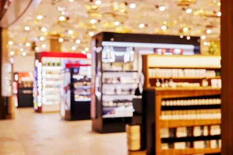 Blurry cosmetics store interior creating bokeh background effect Stock Photos