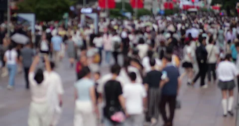 Blurry crowd of people walking in a busy city street of Shanghai Stock Footage 327647837