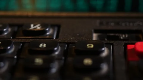 Blurry display of the buttons of the old black calculator Stock Footage 252037634