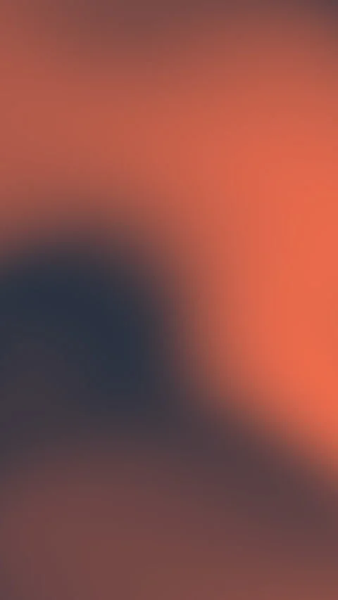 Blurry face closeup in warm orange tones 库存影片 335943786