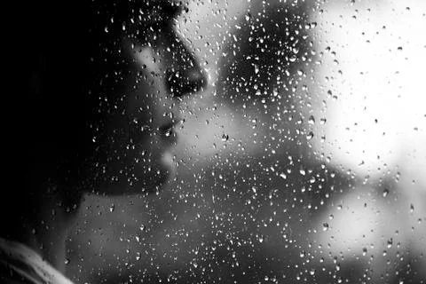 Blurry face in the rain Stock Photos