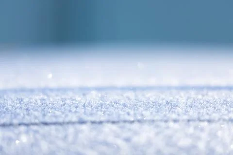 Blurry flicker of the snow surface as a background Fotos de archivo