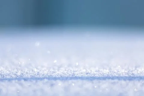 Blurry flicker of the snow surface as a background Fotos de archivo
