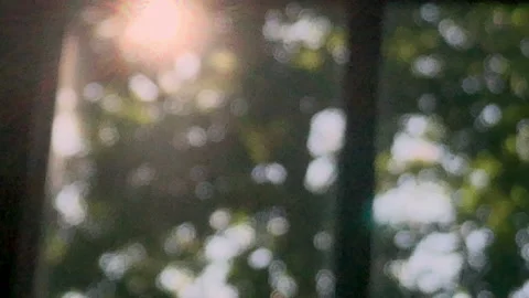Blurry footage of the sun rays through a window. Slow motion. Stock Footage 158832627
