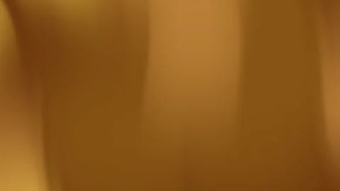 Blurry gold and black gradient background with lights ideal for luxury or c.. Video stock 313175418
