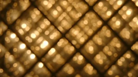Blurry Golden Bokeh Lights Background with Diagonal Grid Lines Stock Footage 343284998
