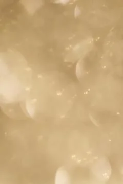 Blurry golden glitter background texture Stock Photos