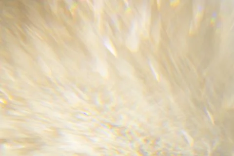 Blurry golden glitter background texture Stock Photos