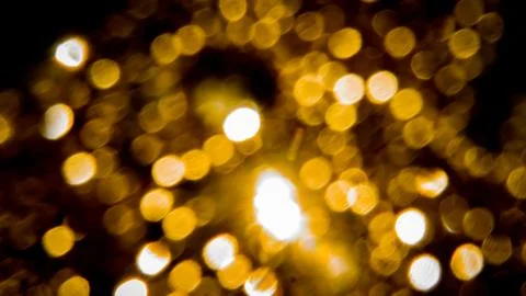 Blurry golden lights Stock Photos