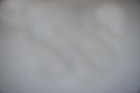 A blurry gray background with a white line Stock Photos