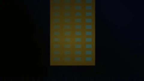 Blurry grid pattern on dark background. Stock Footage 337500315