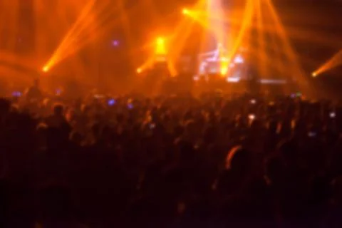 Blurry image background of many audience concert in big rock concert. Stock Photos