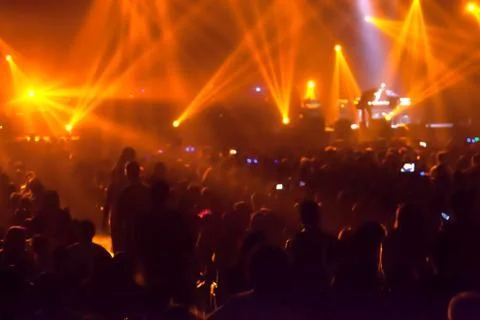 Blurry image background of many audience concert in big rock concert. Stock Photos