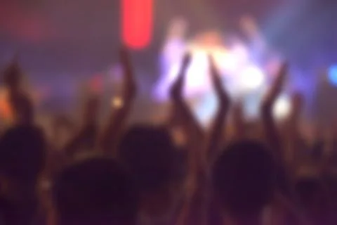 Blurry image background of many audience concert in big rock concert. Stock Photos