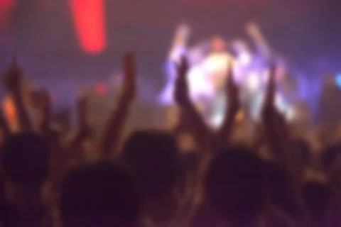 Blurry image background of many audience concert in big rock concert. Stock Photos