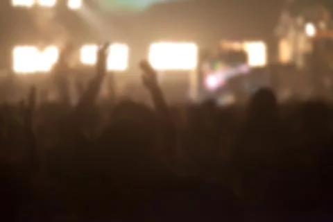 Blurry image background of many audience concert in big rock concert. Stock Photos