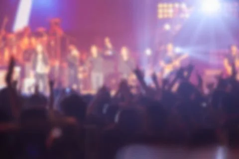 Blurry image background of many audience concert in big rock concert. Stock Photos