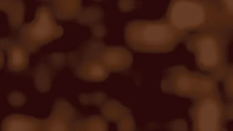 Blurry image of brown shapes on a dark background Stock Footage 310996796