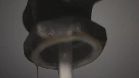 A blurry image of a chair with a dark object in the foreground Stock Footage 302456552