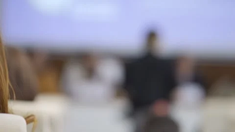 Blurry image of a group of people in a room Stock Footage 310825300