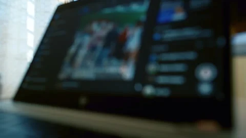 Blurry image of a laptop screen displaying a video call interface Stock Footage 320724451