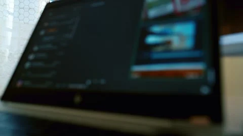 Blurry image of a laptop screen displaying a video call interface Stock Footage 320724486