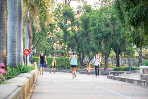 Blurry image people running exercise for health in the Benjakitti Park , Bang Stock Photos