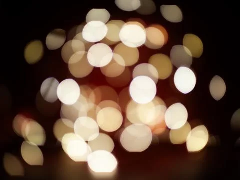 A blurry image of a red background with many white circles Stock Photos