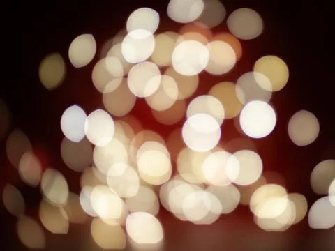 A blurry image of a red background with many white circles Stock Photos