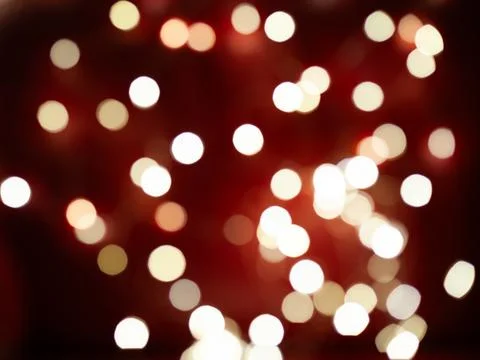 A blurry image of a red background with many white circles Stock Photos