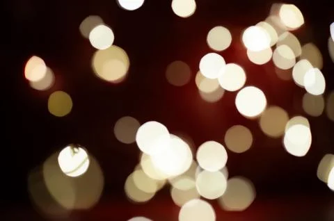 A blurry image of a red background with many white circles Stock Photos