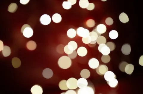 A blurry image of a red background with many white circles Stock Photos